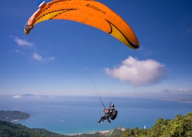 pexels-photo-2162689-2162689 Experience the thrill of paragliding over a stunning ocean view. Perfect for adventure seekers.